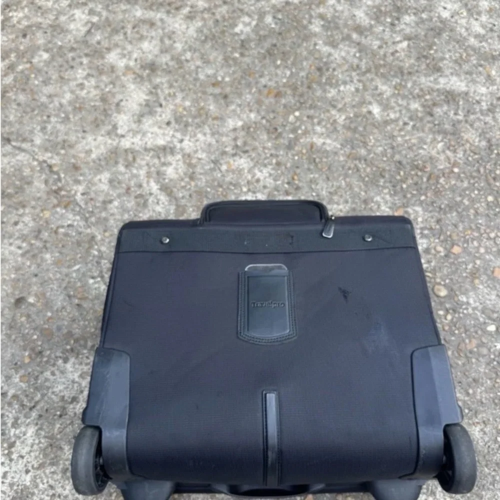 Travelpro Black Soft-Shell Rolling Under-seat Carry-On with Front Pocket